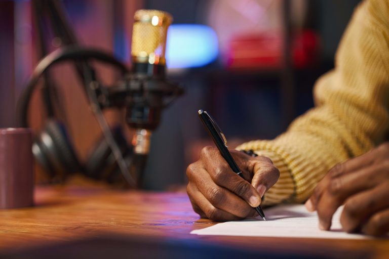 Man Making Content Plan Of Podcast